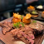 Fuego Steakhouse And Tapas -tomahawk * Potto