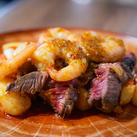 Couette-café Fuego Steakhouse And Tapas -tomahawk *